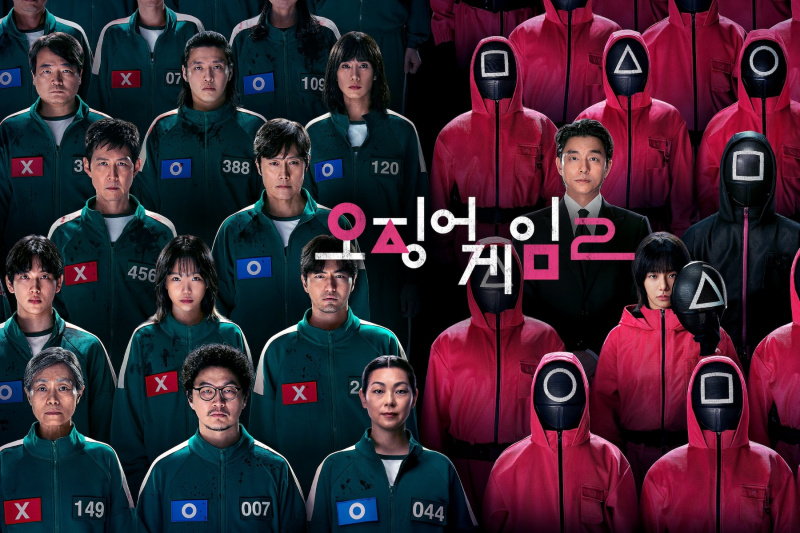Lee Jung Jae e os jogadores ficam do lado oposto dos guardas rosa e do recrutador Gong Yoo em 'Squid Game 2'
