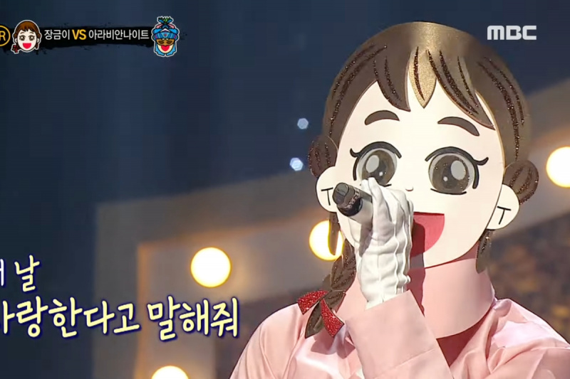Obejrzyj: Główna wokalistka Girl Group i była uczestniczka programu Survival dociera do finałowej rundy „The King Of Mask Singer”